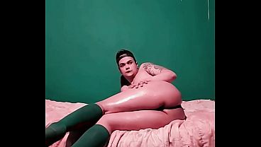 Cute young gay virgin showing off his big oiled-up ass